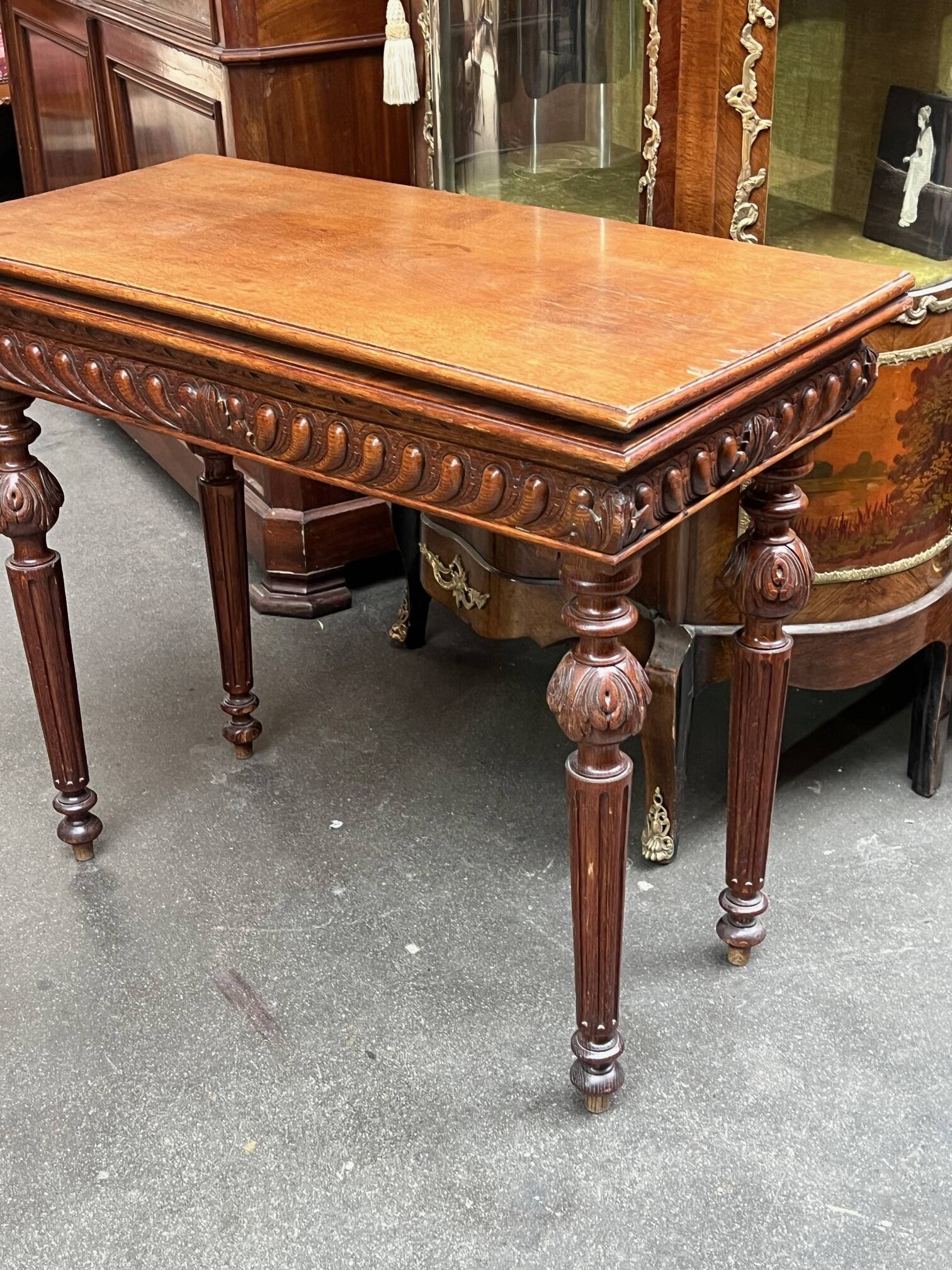Table in Henri II style game console.