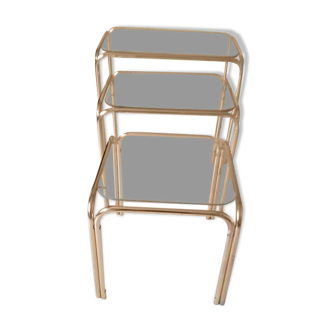 Glass and gold nesting table from the 70s