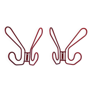 2 red metal hooks