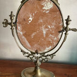 Swivelling brass mirror