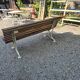 Garden bench with cast iron legs and oak slats