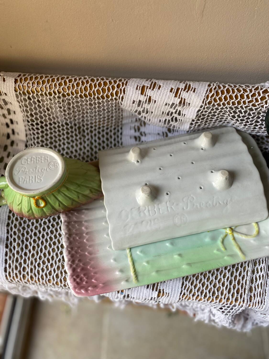 Asparagus dish and sauce boat in slip