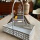 White perforated metal table basket