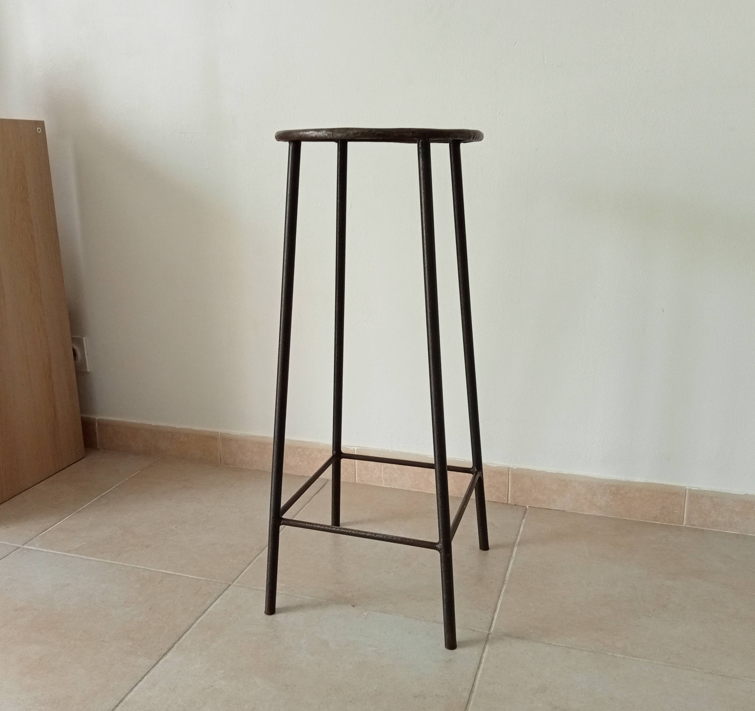 Brutalist high stool from the 1960s in solid steel.