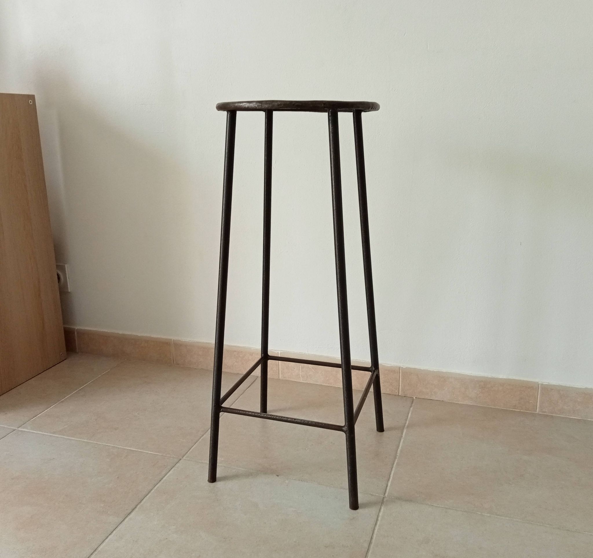 Brutalist high stool from the 1960s in solid steel.