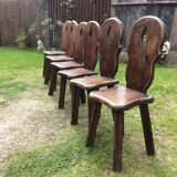 Brutalist rustic vintage chairs in solid oak. ( Series of 6 )