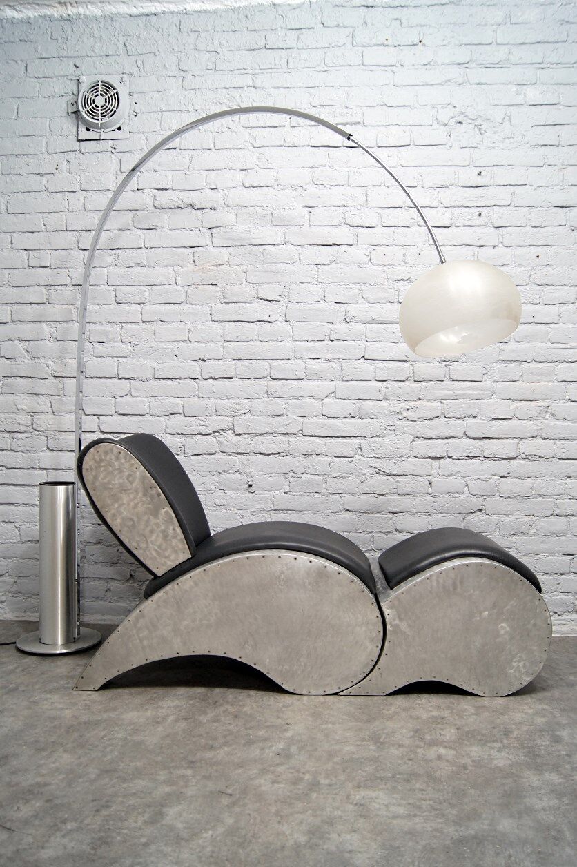 Industrial aluminum & vinyl lounge chair with footrest, 1970s