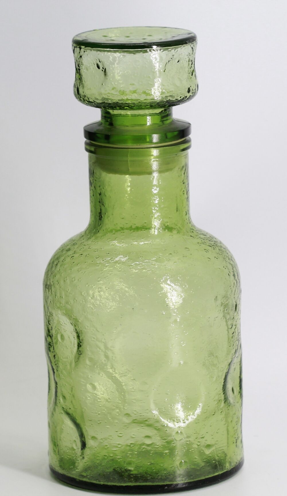 Green bottle made of old glass