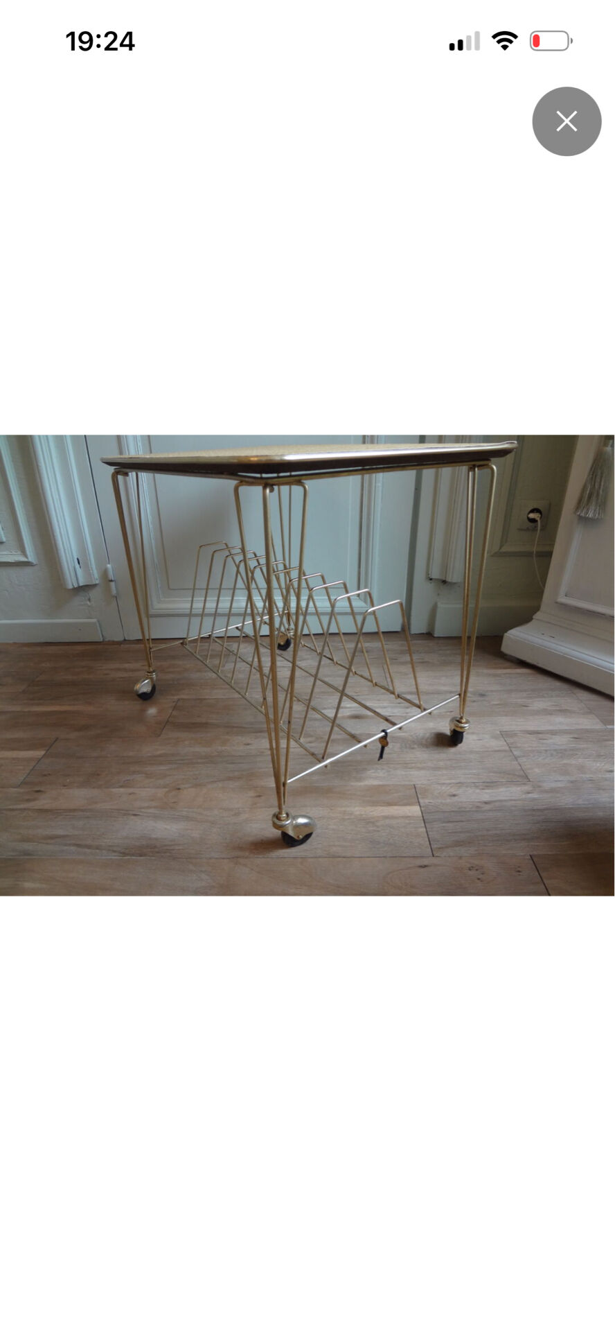 Rolling table for magazines or vinyl records.