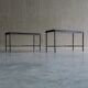 Set of 2 minimalist metal side tables with plaster-fiber tops