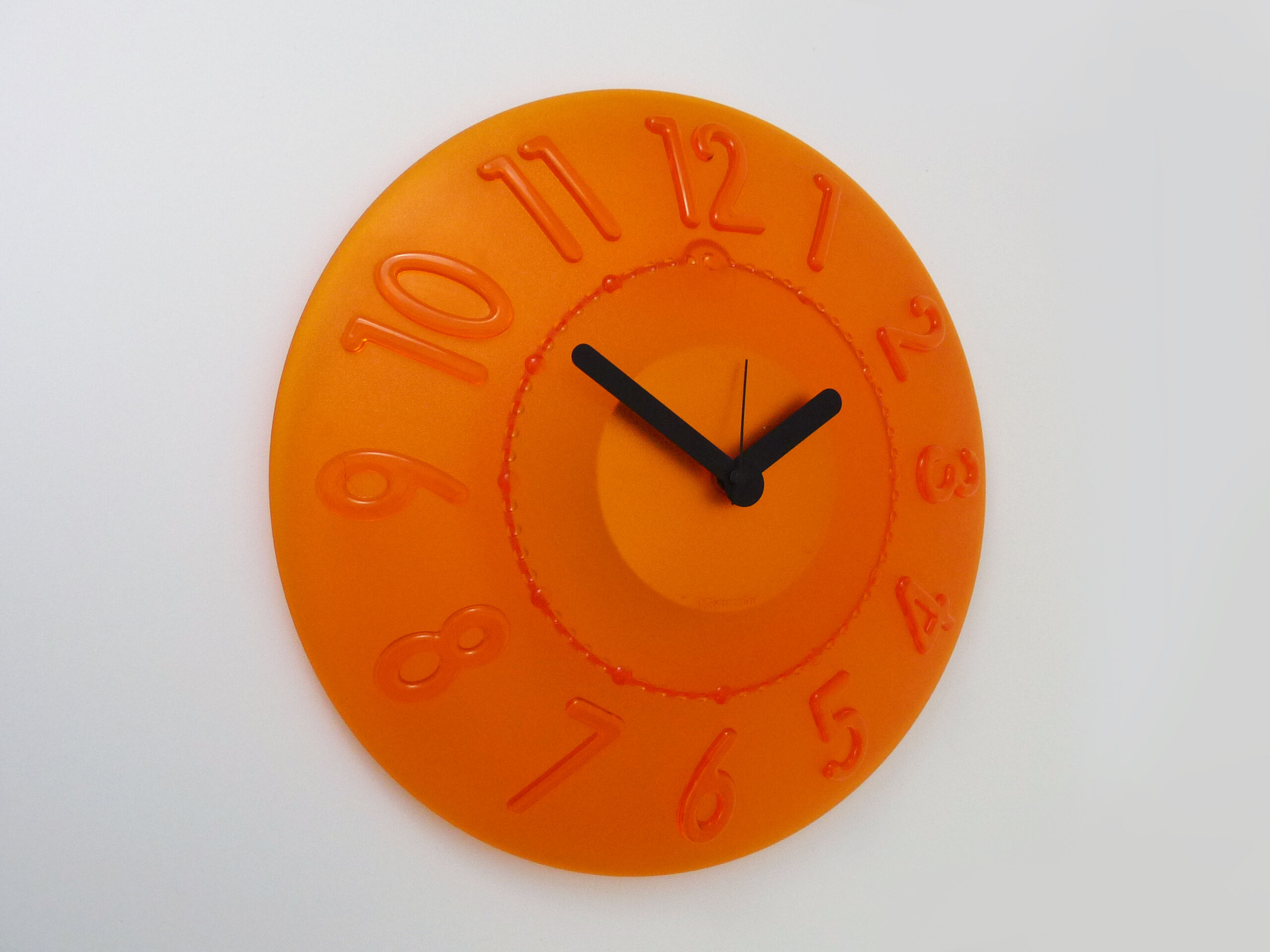 Guzzini orange wall clock from the 1980s