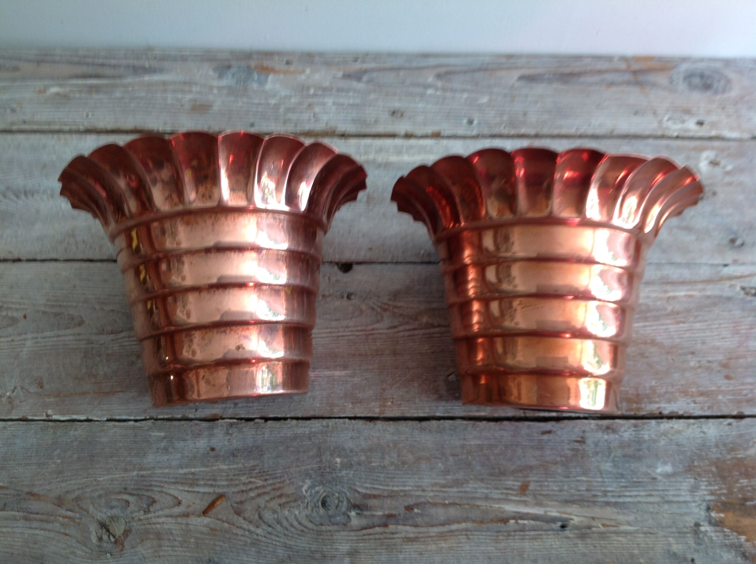Duo of cache copper pots