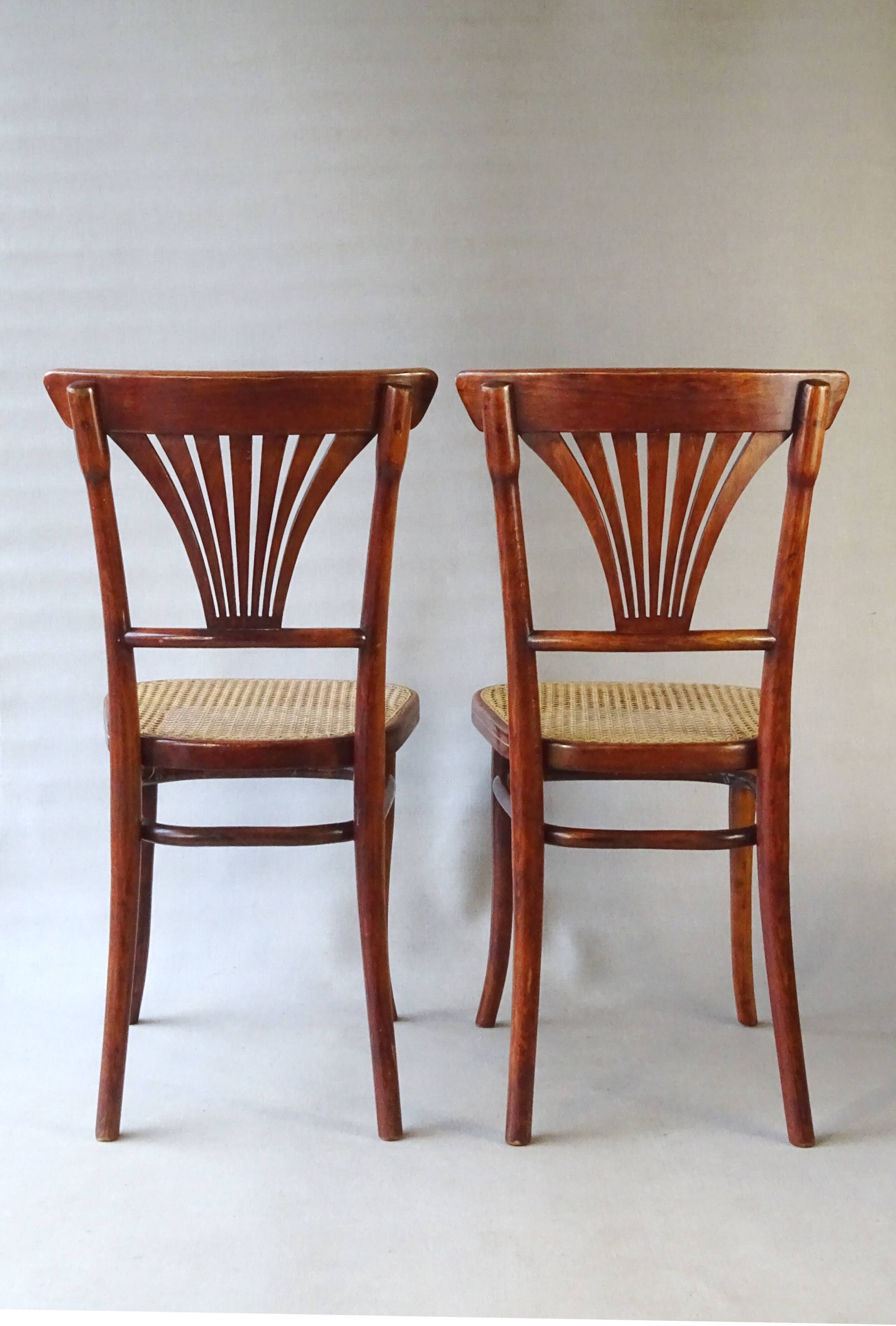 2 Thonet N°221 chairs, caned Art Nouveau bronze decor