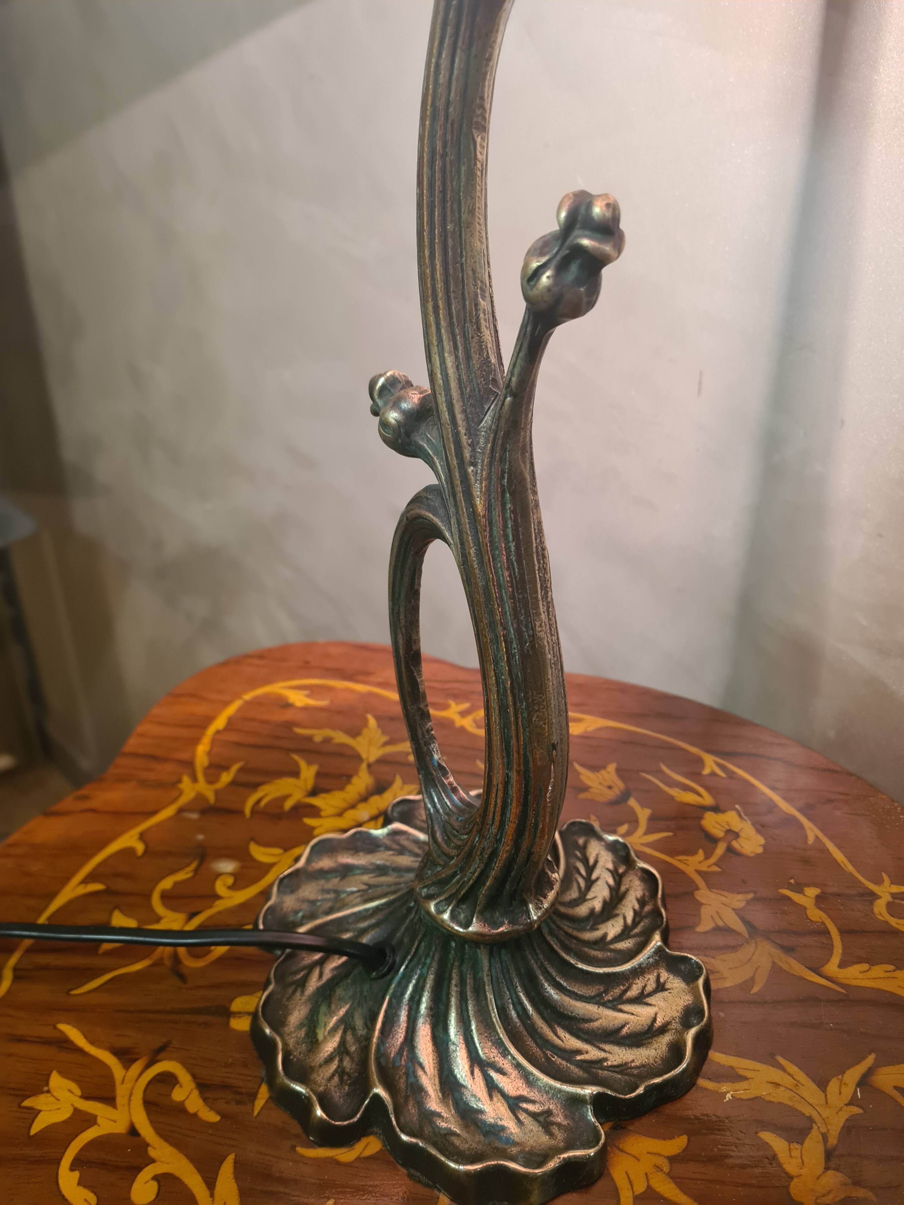 Bronze lamp in Art Nouveau style from 1975 to 1985 with a high-quality glass shade.
