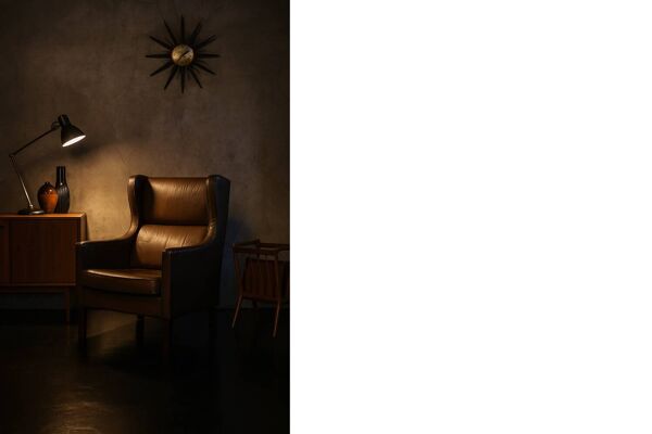 Brown leather wingback chair in mid-century modern Danish style, 1960s.