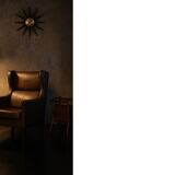 Brown leather wingback chair in mid-century modern Danish style, 1960s.