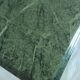 Green marble coffee table with vintage brass.