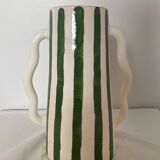 Handmade green and white striped ceramic vase with abstract corrugated handheld