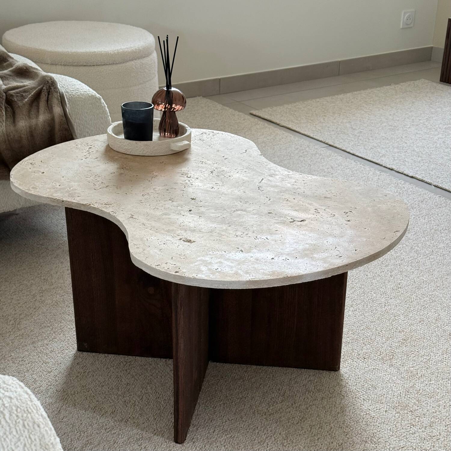 Cloud coffee table in travertine and dark oak.