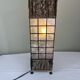 Capiz shell lamp and woven twigs