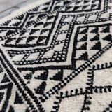 Handwoven black and white rug