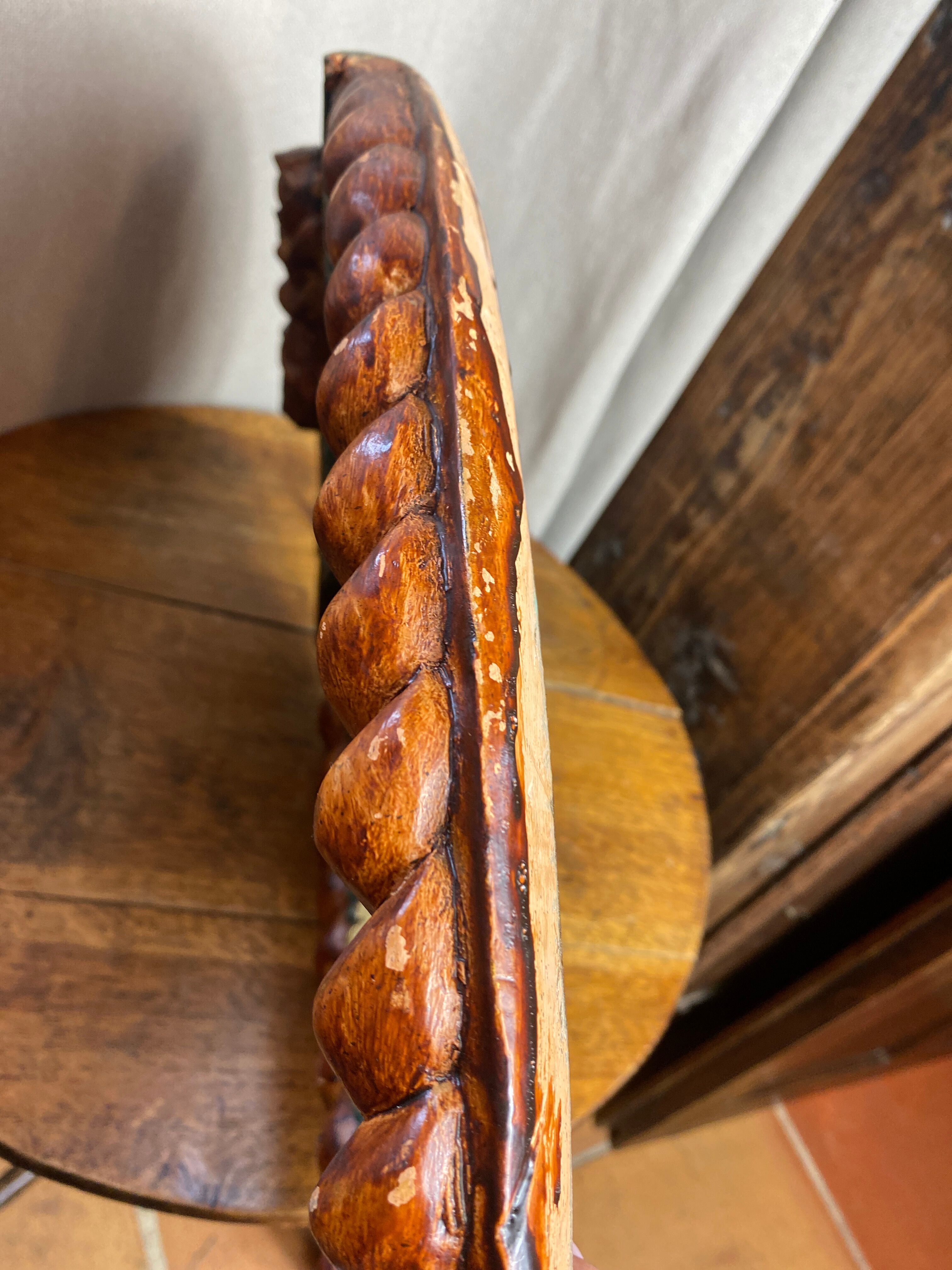 Oval mirror in carved wood