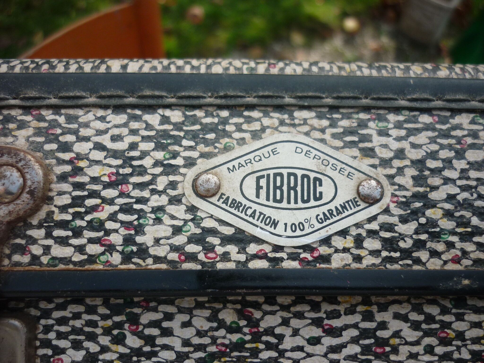Antique black and white fibroc suitcase