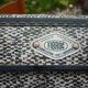 Antique black and white fibroc suitcase