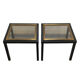 Paire de tables d’appoint noires et dorées