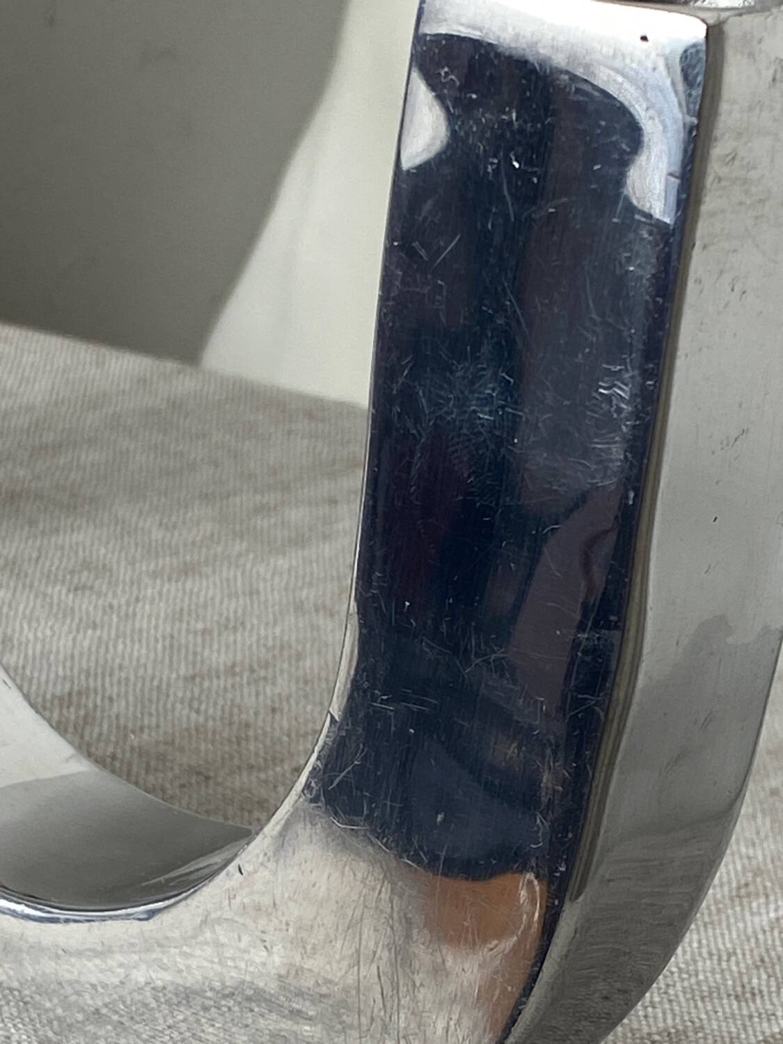 Designer candle holders in brushed aluminum