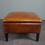 Schapenleren armchair and studio lounge stool