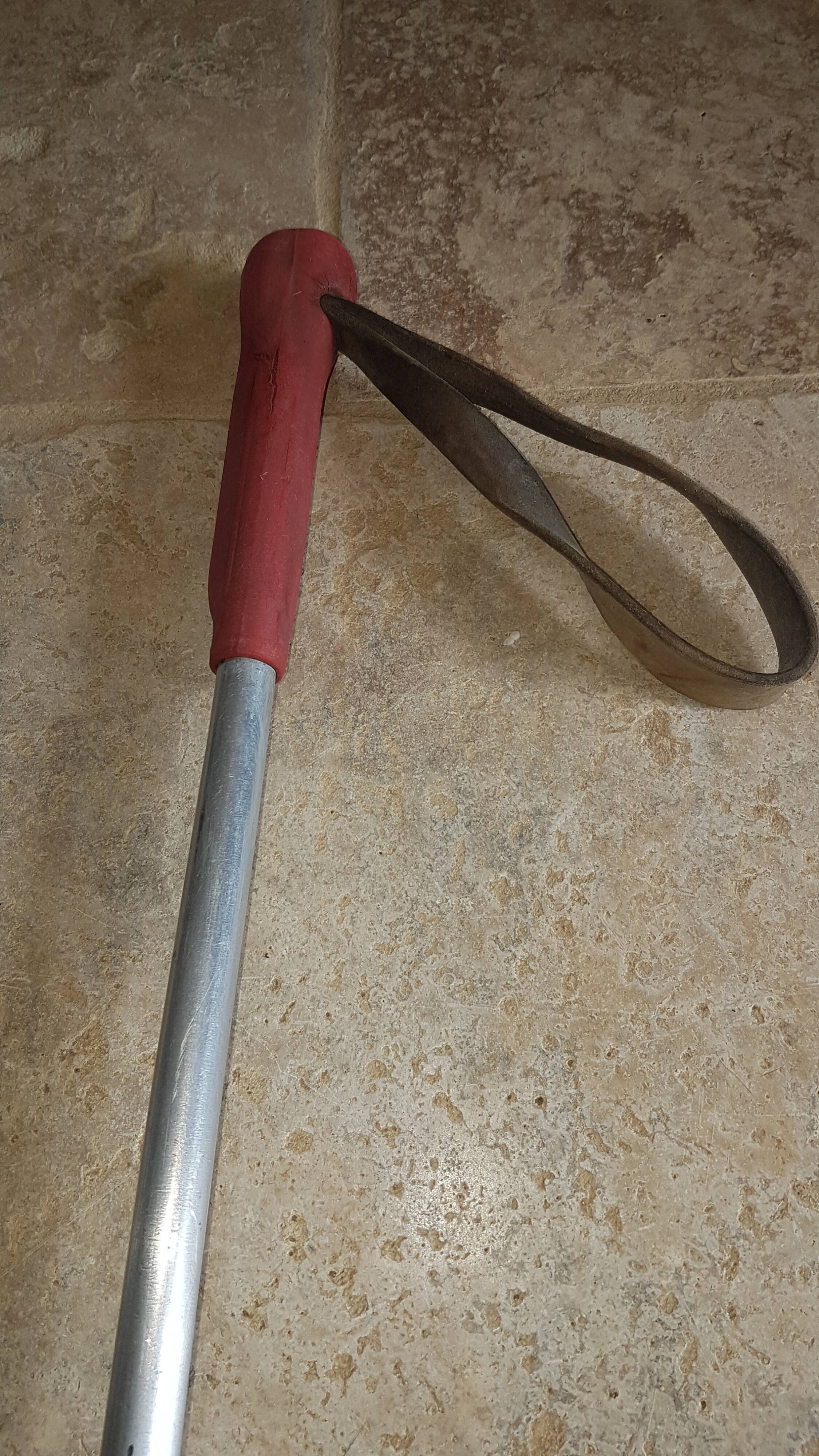 Old skis wooden and its pair of sticks