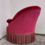 Old raspberry velvet toad armchair