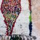 Vintage Boujaad wool table runner: red and black Moroccan rug.