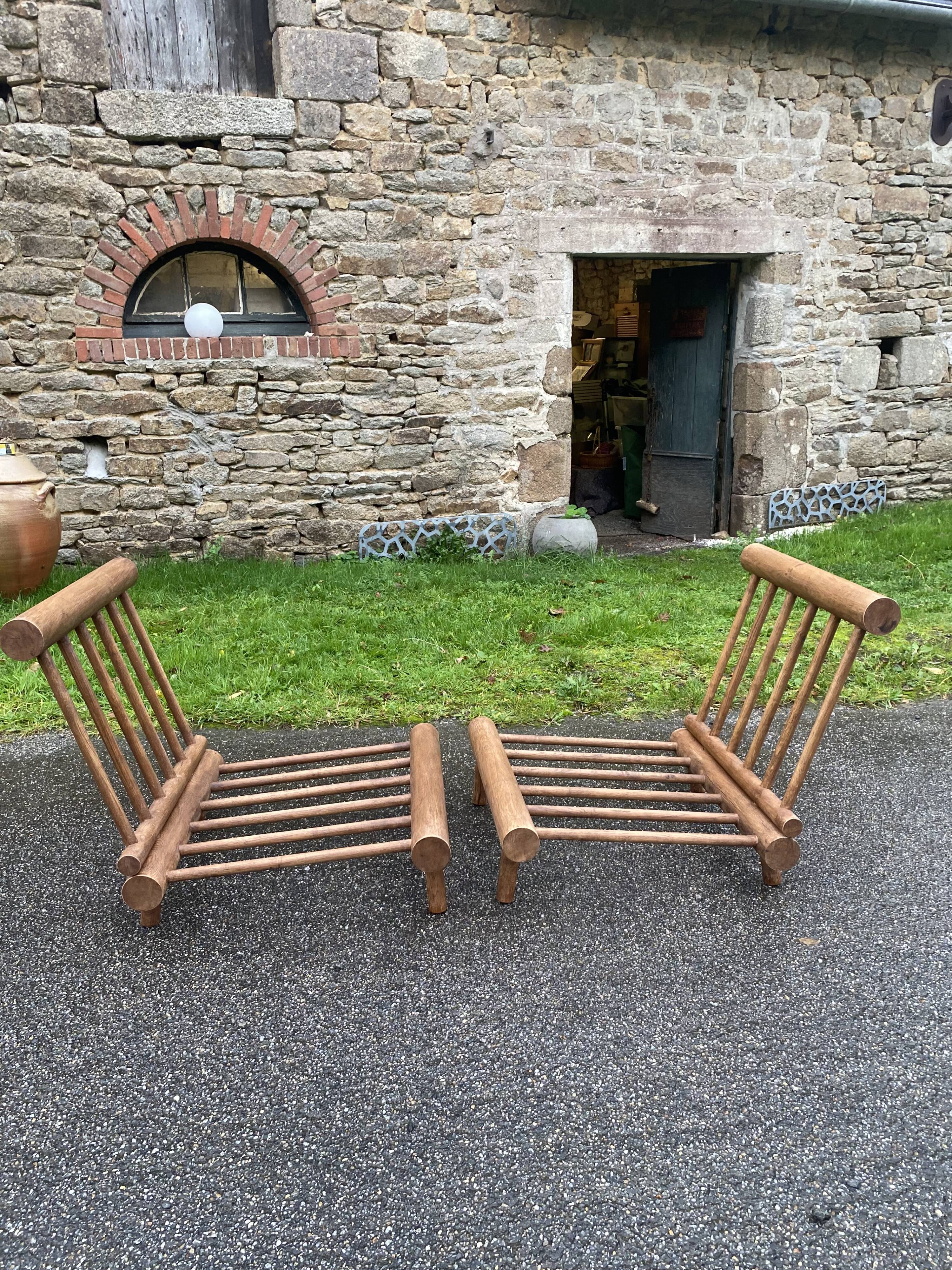 Charlotte Perriand Pair of oak lounge chairs Les Arcs 1600