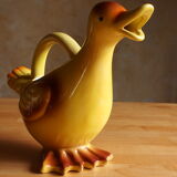 Ceramic watering can in white earthenware, yellow enamel and bird shape