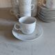11 cups and saucers
