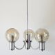 Three-branched chandelier, in chrome and smoked glass globes, Design, 1970
