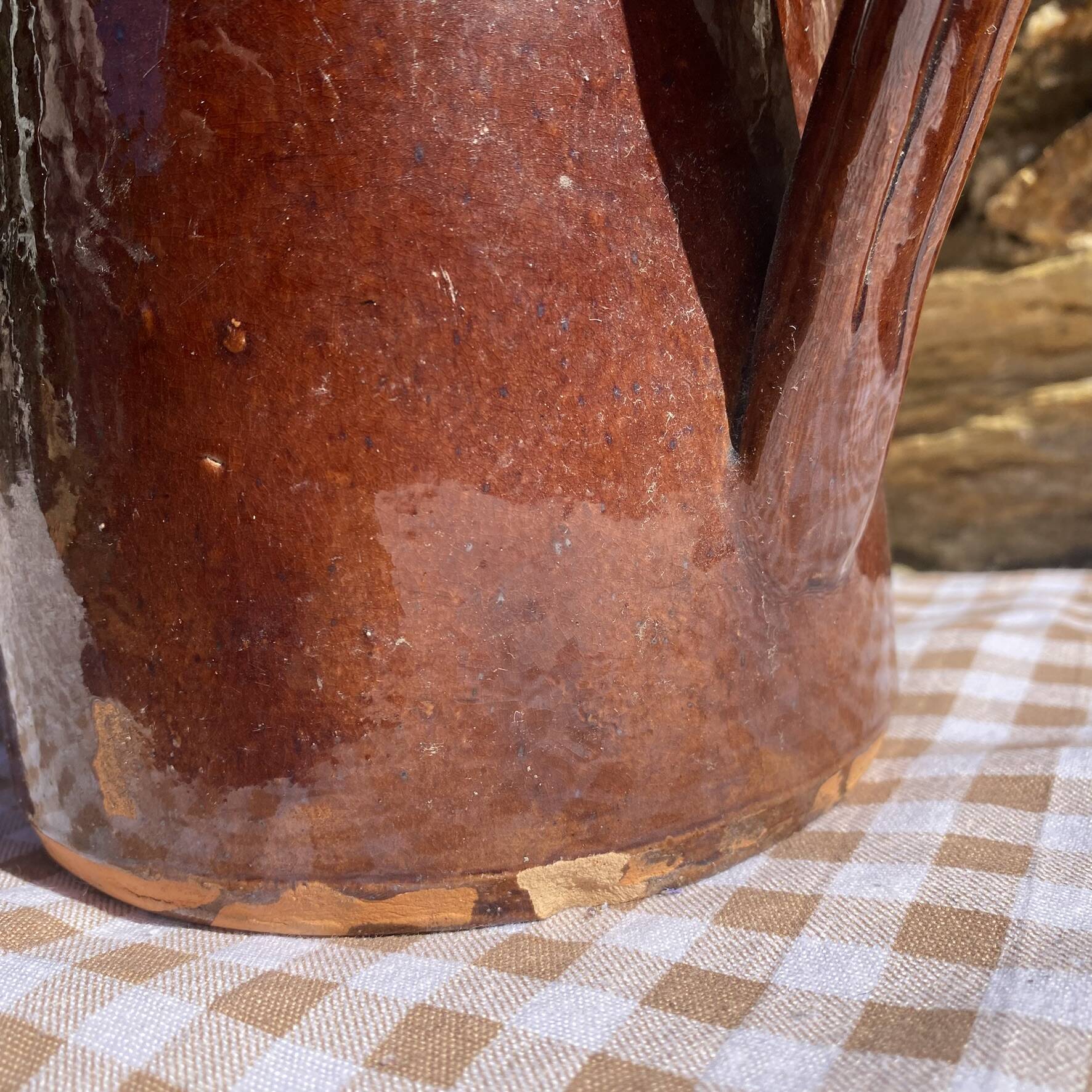 Old glazed terracotta pitcher