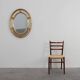 20th century neo-classical style tilted oval mirror by Deknudt, Belgium