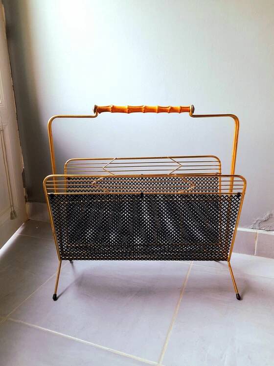 Perforated metal magazine rack, 1950