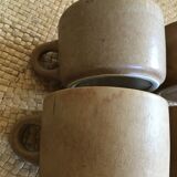 Series of 4 cups of sandstone