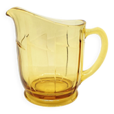 Small pitcher in amber yellow glass in art deco style