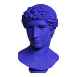 Large bust of a Greek Roman Apollo on a pedestal