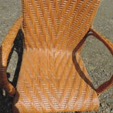 Rattan armchair with high backrest