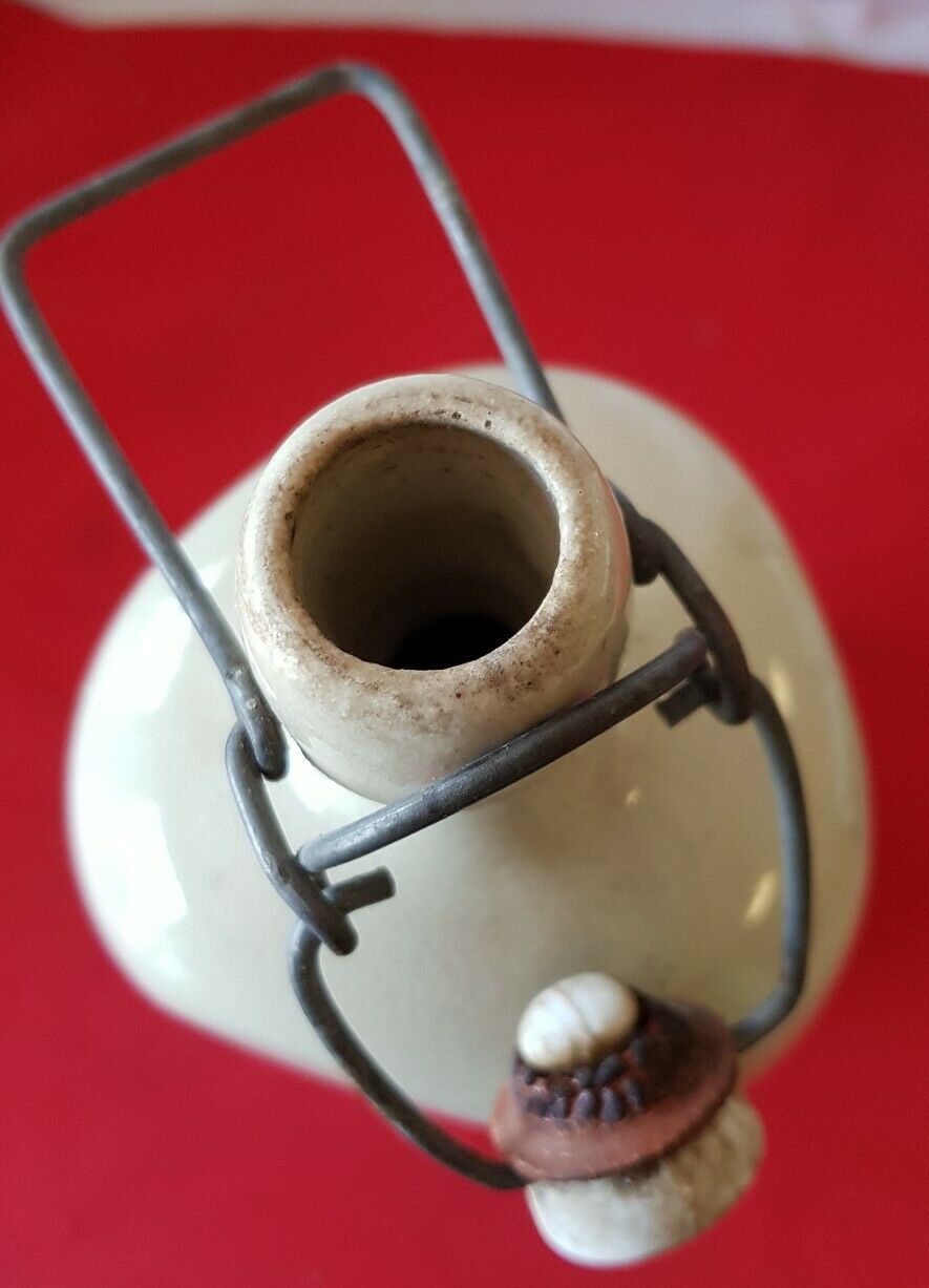 Bouteille en grès vernisse avec bouchon porcelaine