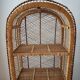 Rattan shelf on legs circa 1960
