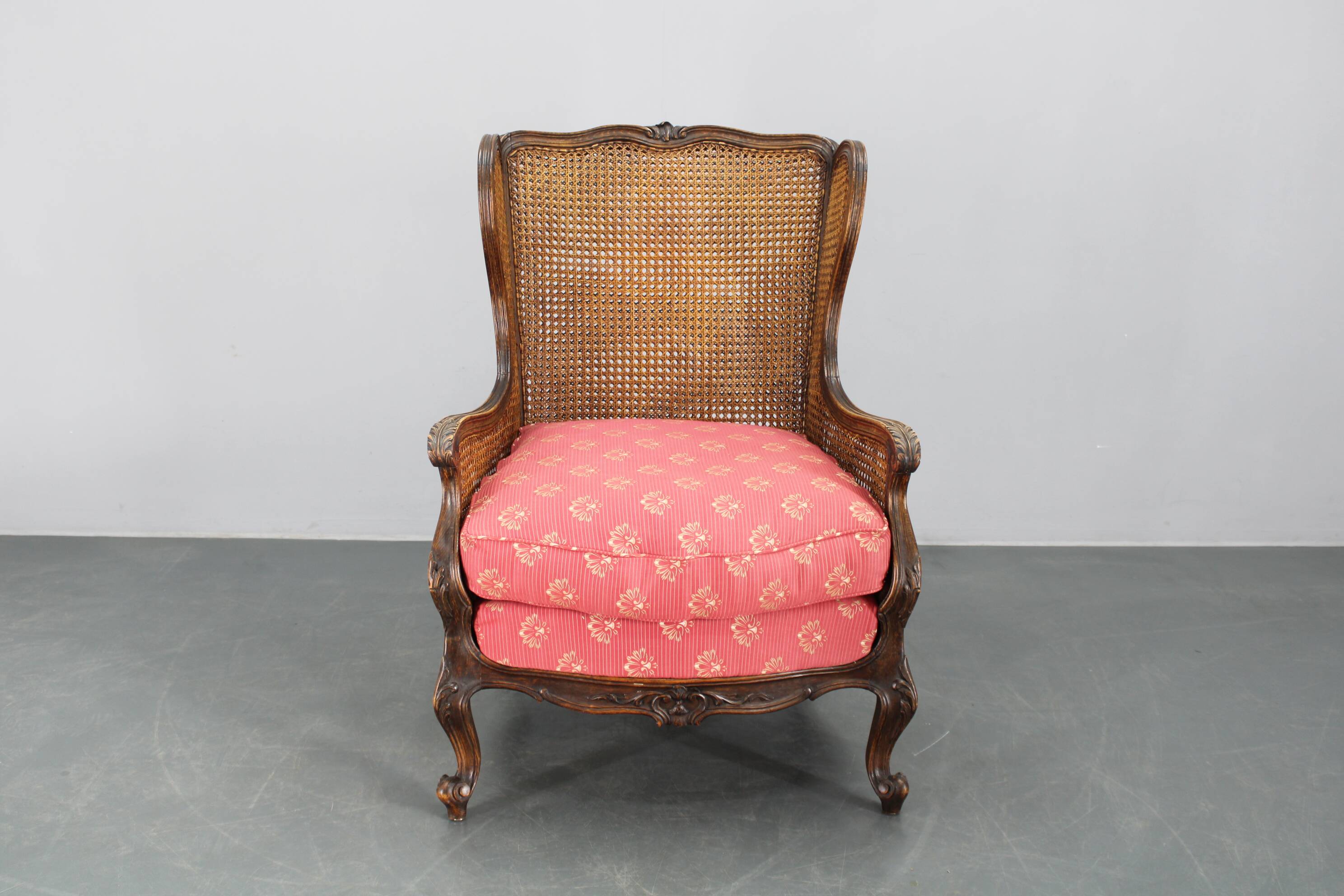 Antique Carved Wing Chair with Cane Sides , Czechoslovakia