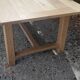 Large solid oak farmhouse table in raw wood