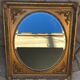 Miroir en bois doré  67 x 77 cm